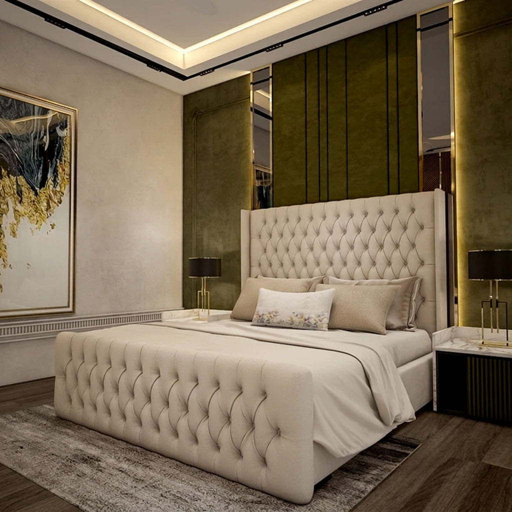 Luxurious bedroom with a tufted headboard and matching bedding, featuring RN Interiors Ltd branding.