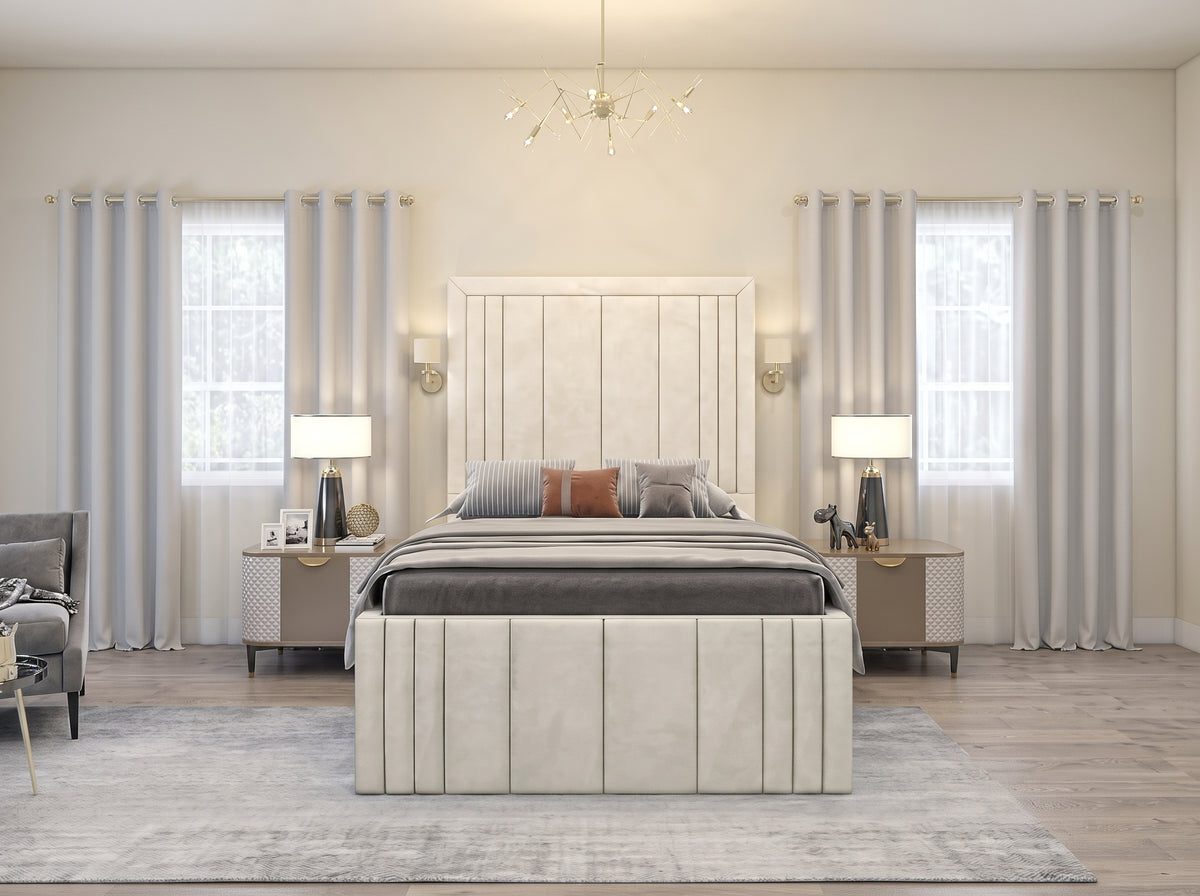 A modern bedroom featuring a light beige upholstered bed frame with a tall vertical slatted headboard and matching bench at the foot. The bed is styled with gray and brown pillows and a gray duvet.