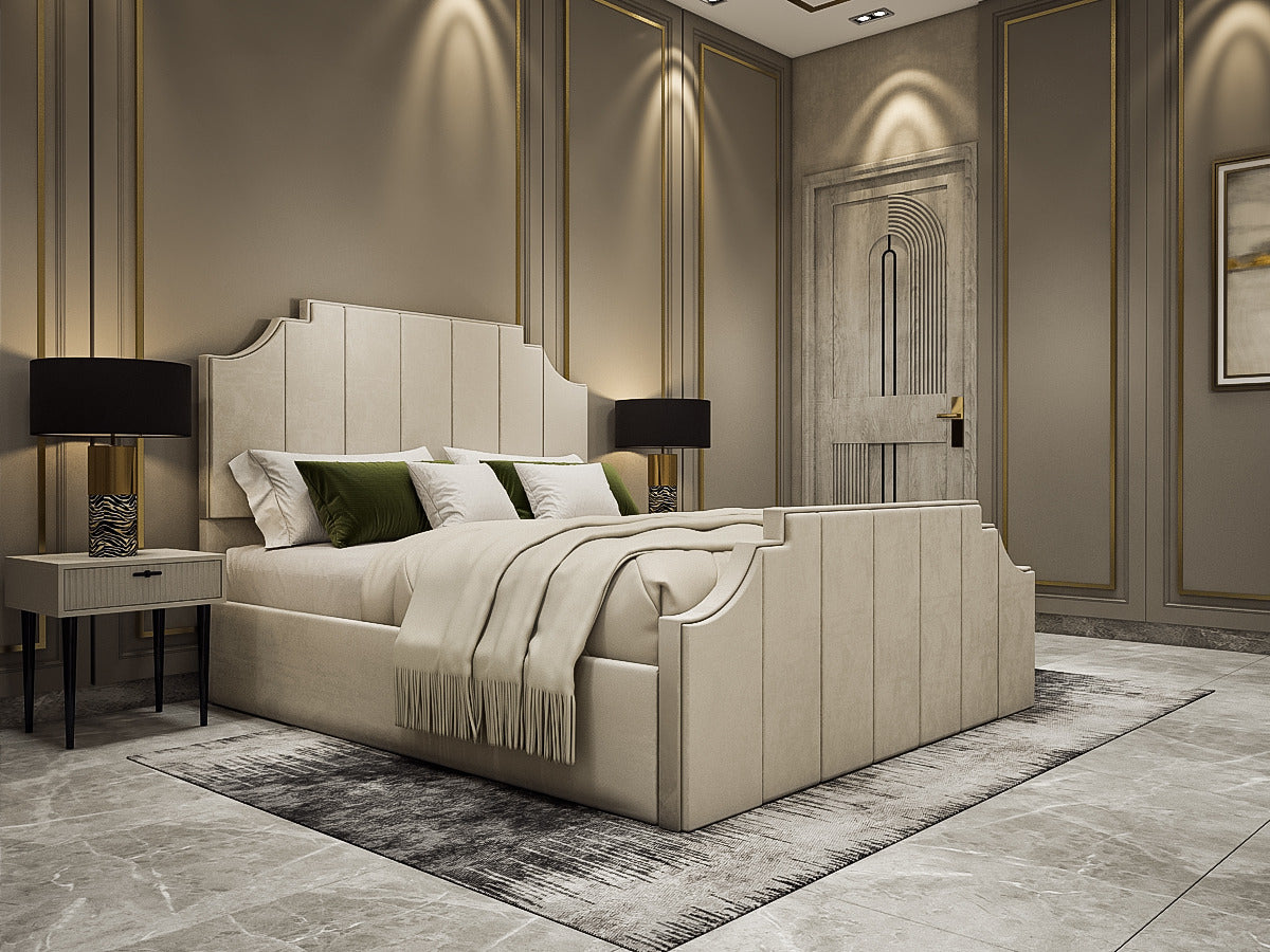 A modern upholstered bed in a luxurious bedroom setting with beige walls, gold trim, matching nightstands, and a gray rug.
